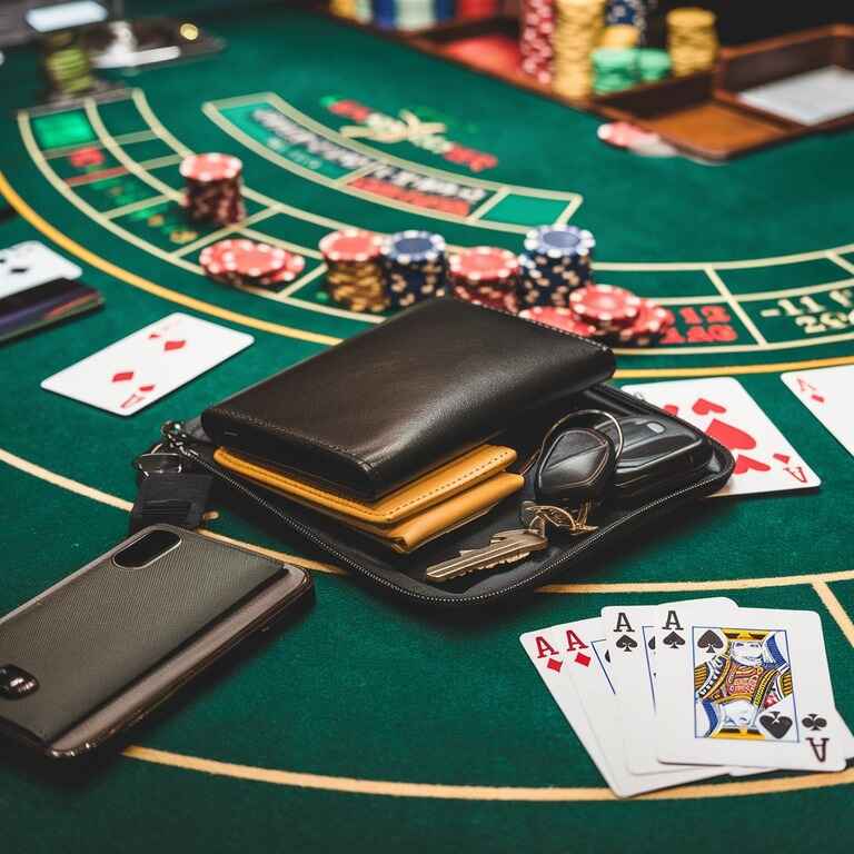 Personal items neatly stored in a secure bag at a Las Vegas casino table